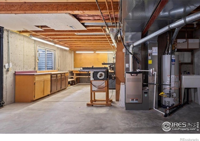 1528 16th Pl, Longmont, CO 80501 - unfinished below grade area with gas water heater and a sink