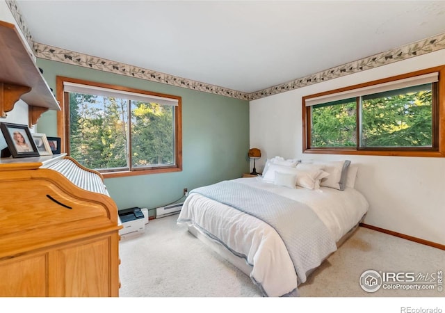 216 N Gold Flake, Breckenridge, CO 80424 - bedroom with a baseboard radiator, carpet floors, and baseboards