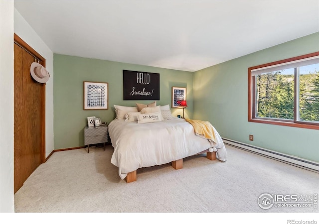 216 N Gold Flake, Breckenridge, CO 80424 - bedroom with carpet flooring, a baseboard heating unit, and baseboards