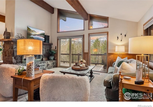 216 N Gold Flake, Breckenridge, CO 80424 - living area with carpet flooring, high vaulted ceiling, beam ceiling, and wainscoting