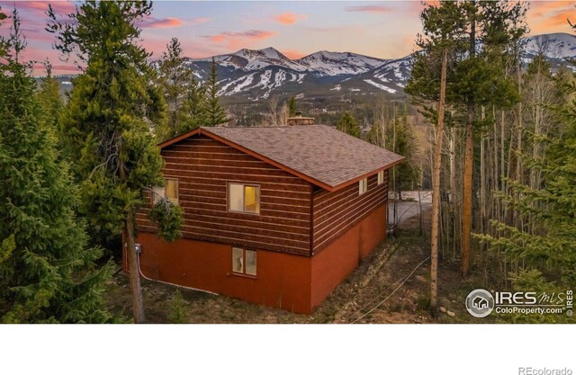 216 N Gold Flake, Breckenridge, CO 80424 - view of property exterior with a mountain view and roof with shingles