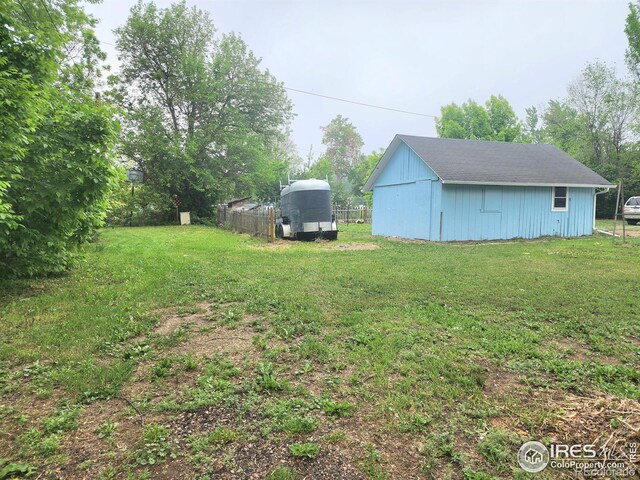 936 E 4th St, Loveland, CO 80537 - view of yard with an outbuilding