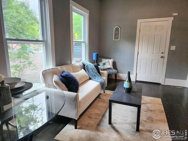 936 E 4th St, Loveland, CO 80537 - living room with baseboards and wood finished floors