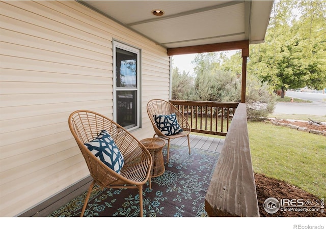 1155 Monroe Ave, Loveland, CO 80537 - porch with a lawn