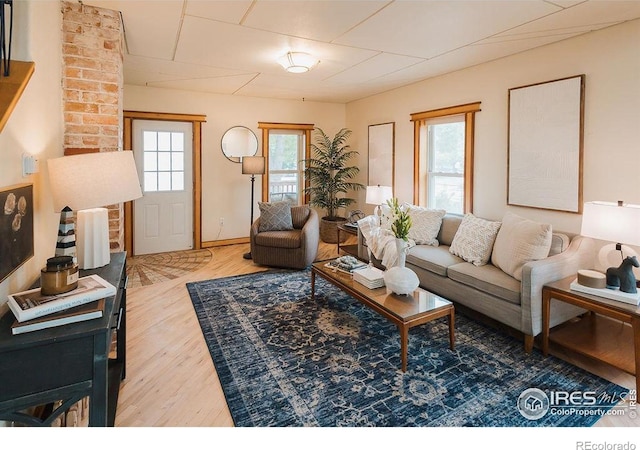 1155 Monroe Ave, Loveland, CO 80537 - living room featuring wood finished floors and baseboards