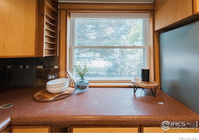 1155 Monroe Ave, Loveland, CO 80537 - kitchen featuring dark countertops