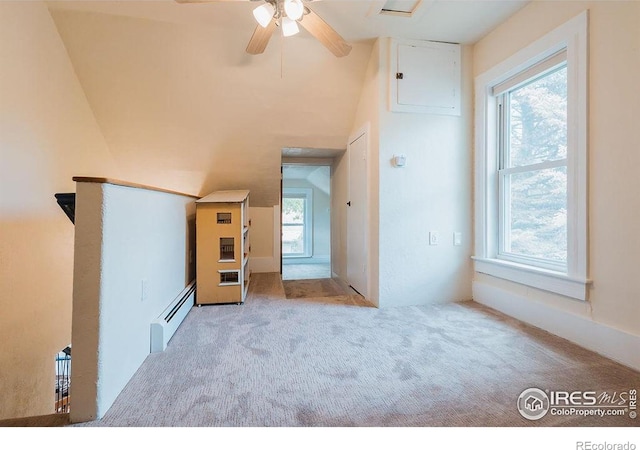 1155 Monroe Ave, Loveland, CO 80537 - unfurnished living room featuring baseboard heating, carpet flooring, and ceiling fan