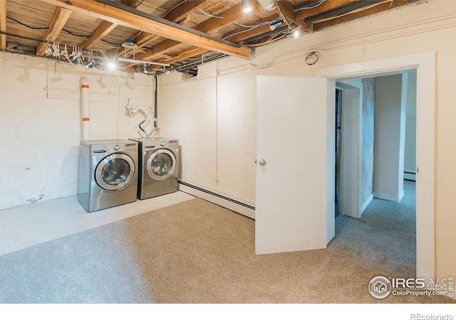 1155 Monroe Ave, Loveland, CO 80537 - washroom with washer and clothes dryer, a baseboard heating unit, and a baseboard radiator