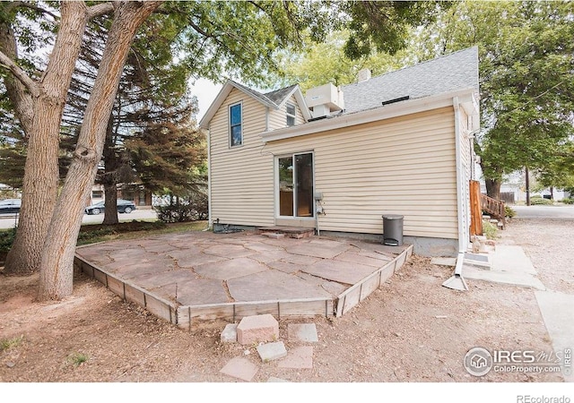 1155 Monroe Ave, Loveland, CO 80537 - rear view of house featuring a patio