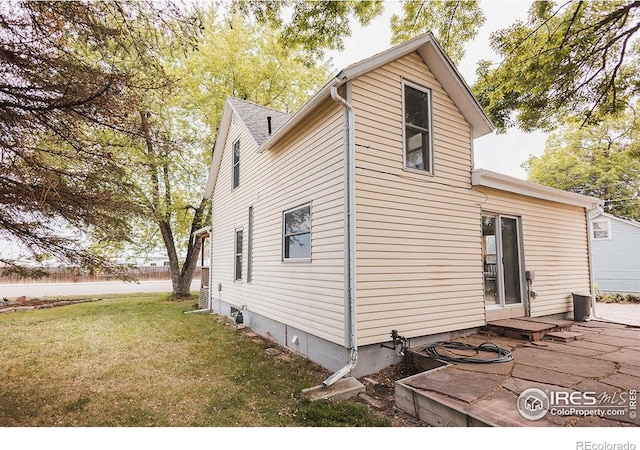 1155 Monroe Ave, Loveland, CO 80537 - view of property exterior featuring a yard