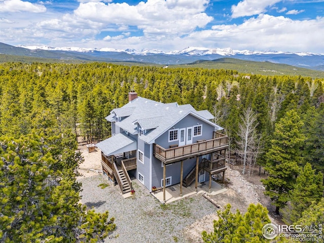 266 Gap Rd, Black Hawk, CO 80422 - aerial view of property and surrounding area featuring a forest and mountains