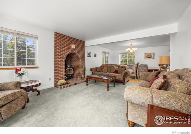 266 Gap Rd, Black Hawk, CO 80422 - carpeted living area featuring a wood stove, a chandelier, healthy amount of natural light, and baseboards