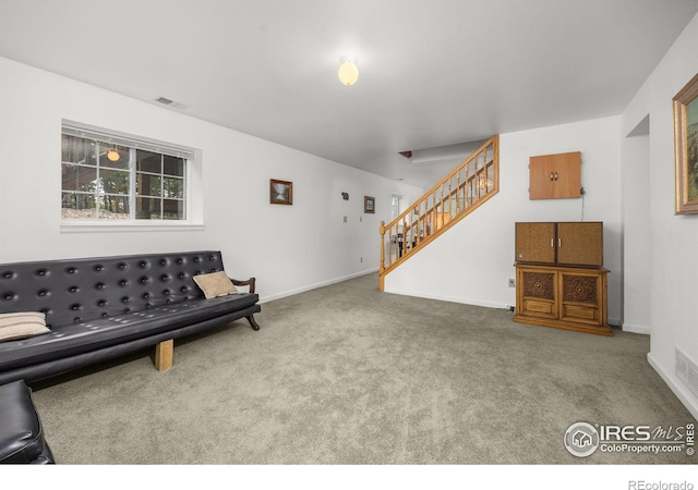266 Gap Rd, Black Hawk, CO 80422 - carpeted living room with stairs and baseboards