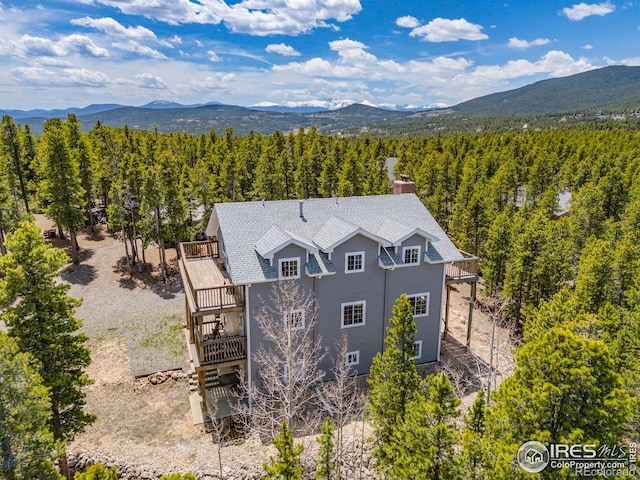 266 Gap Rd, Black Hawk, CO 80422 - aerial view of property and surrounding area featuring a mountainous background and a forest