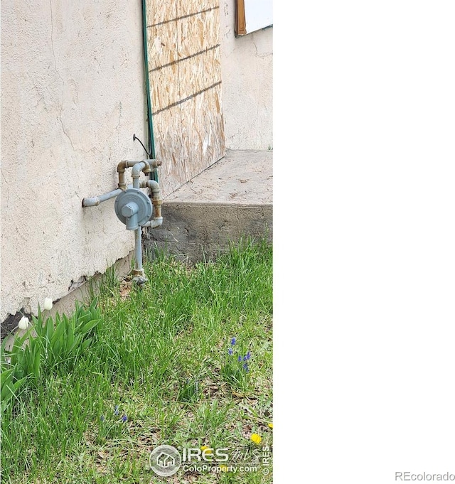 701 Phelps St, Sterling, CO 80751 - exterior view of stucco siding