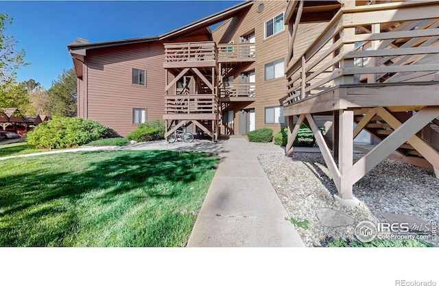 6110 Habitat Dr Unit 2, Boulder, CO 80301 - view of building exterior featuring stairs