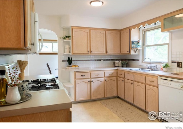 508 W 11th St, Loveland, CO 80537 - kitchen with dishwasher, open shelves, a sink, and healthy amount of natural light
