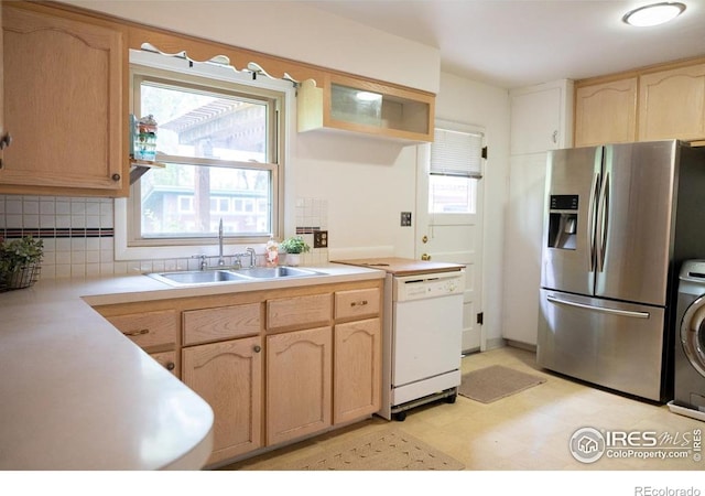 508 W 11th St, Loveland, CO 80537 - kitchen featuring stainless steel refrigerator with ice dispenser, a sink, dishwasher, light brown cabinetry, and tasteful backsplash