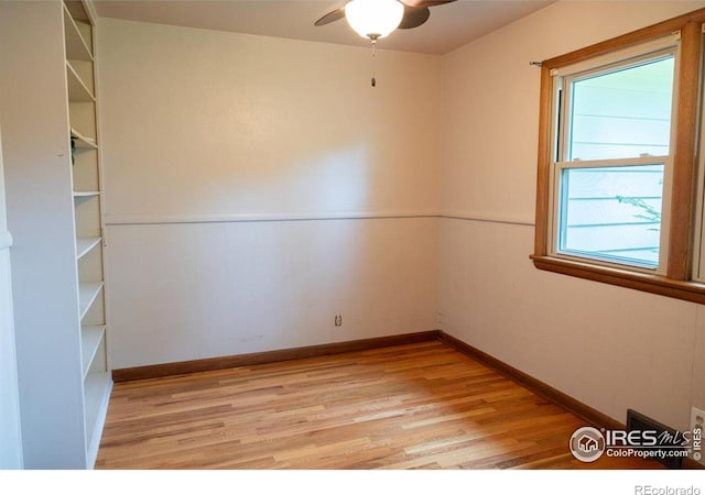 508 W 11th St, Loveland, CO 80537 - spare room with light wood finished floors, ceiling fan, and baseboards