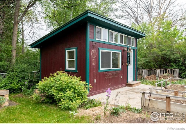 508 W 11th St, Loveland, CO 80537 - view of outbuilding with a garden