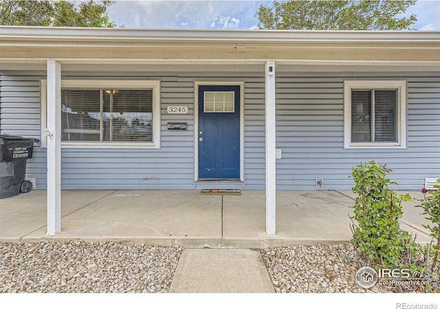 3245 W Walsh Pl, Denver, CO 80219 - property entrance with covered porch