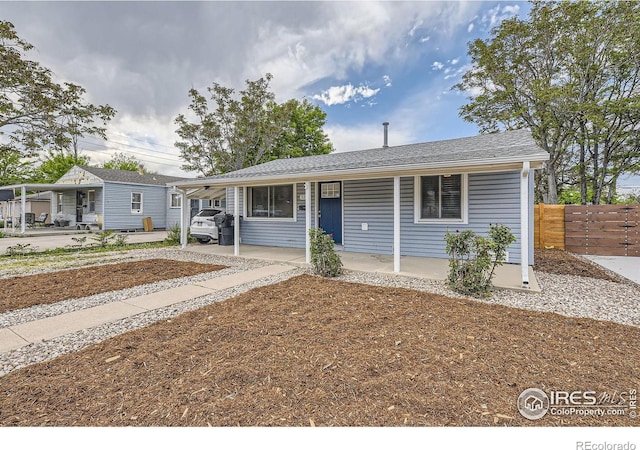 3245 W Walsh Pl, Denver, CO 80219 - single story home featuring a porch and a carport