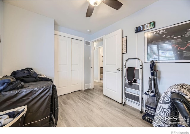 3245 W Walsh Pl, Denver, CO 80219 - bedroom featuring light wood-style floors, a closet, and ceiling fan