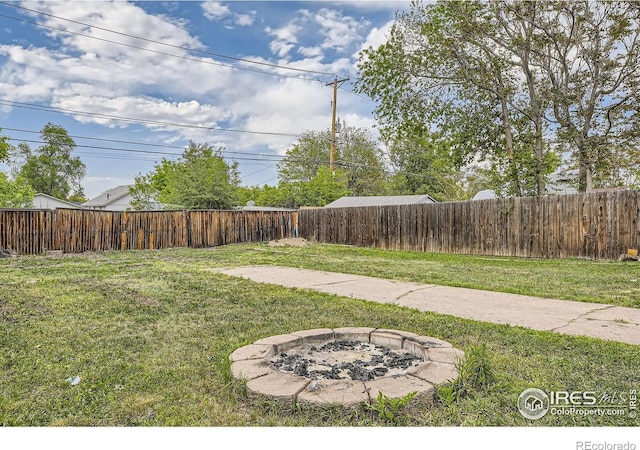3245 W Walsh Pl, Denver, CO 80219 - view of yard featuring a fire pit