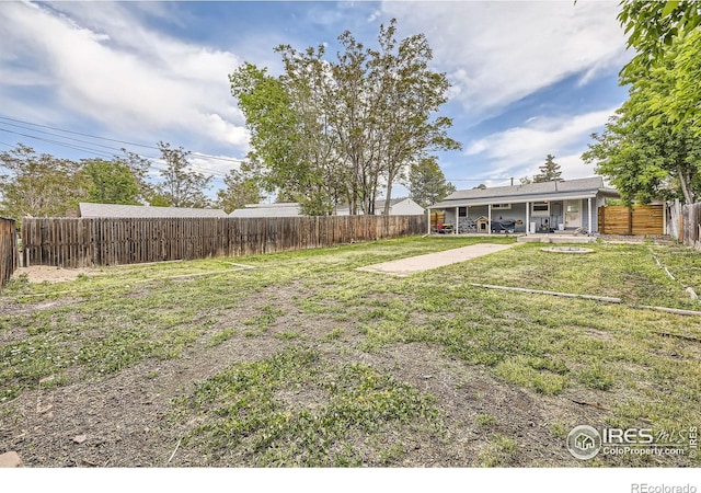 3245 W Walsh Pl, Denver, CO 80219 - view of yard featuring a patio