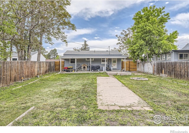 3245 W Walsh Pl, Denver, CO 80219 - rear view of property featuring a fire pit and a patio area