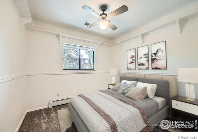 1830 22nd St Unit 15, Boulder, CO 80302 - carpeted bedroom with a baseboard heating unit and ceiling fan