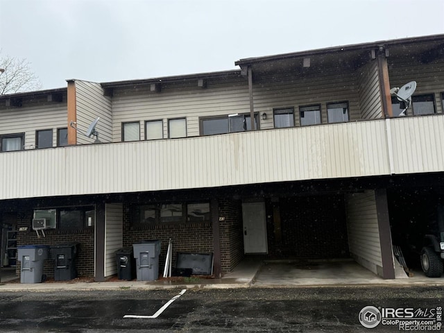 1943 Meadow Dr Unit B2, Longmont, CO 80501 - view of property featuring uncovered parking