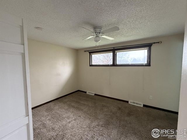 1943 Meadow Dr Unit B2, Longmont, CO 80501 - carpeted spare room with a ceiling fan, a textured ceiling, and baseboards