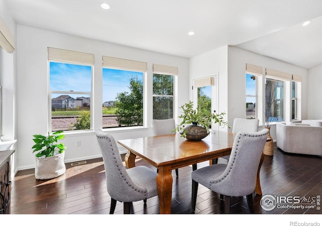 6614 Neota Creek Ct, Timnath, CO 80547 - dining space with dark wood-type flooring, recessed lighting, and baseboards
