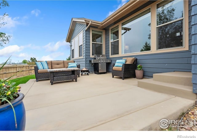6614 Neota Creek Ct, Timnath, CO 80547 - view of patio featuring a grill and an outdoor hangout area