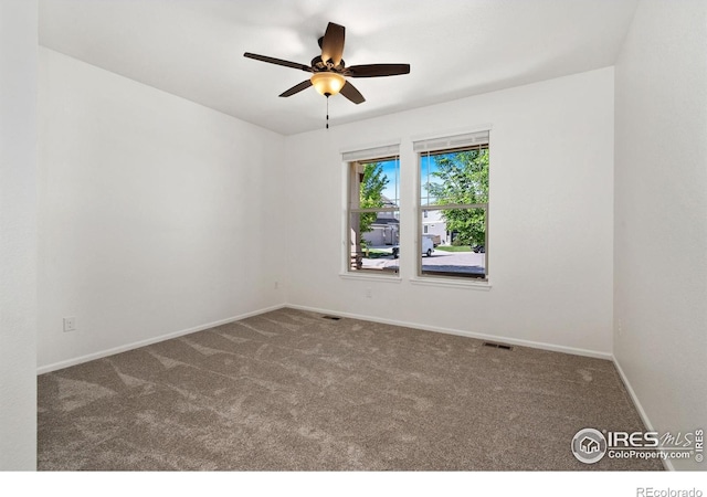6614 Neota Creek Ct, Timnath, CO 80547 - carpeted spare room with a ceiling fan and baseboards
