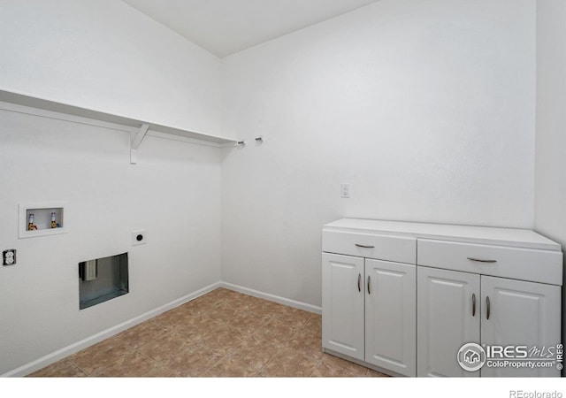 6614 Neota Creek Ct, Timnath, CO 80547 - washroom featuring washer hookup, cabinet space, baseboards, and electric dryer hookup