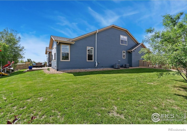 6614 Neota Creek Ct, Timnath, CO 80547 - back of property with central AC