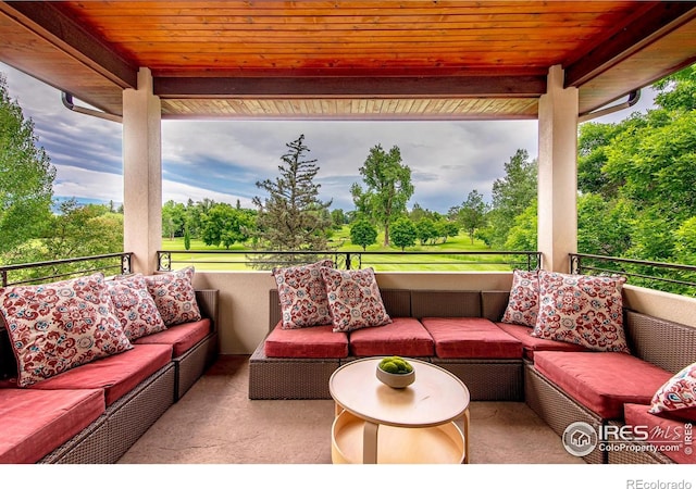 7205 Rustic Trl, Boulder, CO 80301 - view of patio / terrace with an outdoor living space, view of scattered trees, and a balcony