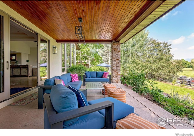 7205 Rustic Trl, Boulder, CO 80301 - view of patio / terrace featuring an outdoor hangout area