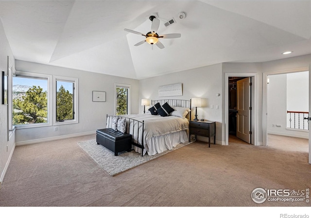 290 Skyhill Dr, Evergreen, CO 80439 - carpeted bedroom with lofted ceiling, baseboards, a spacious closet, recessed lighting, and ceiling fan