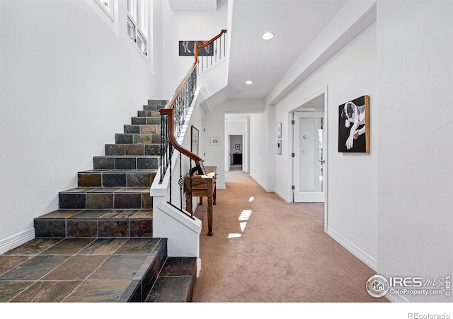 290 Skyhill Dr, Evergreen, CO 80439 - foyer featuring stairs, recessed lighting, baseboards, and carpet flooring