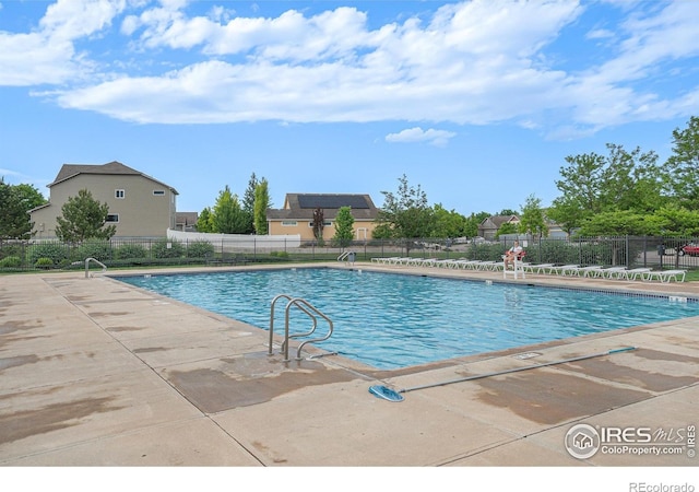 2502 Ballard Ln, Fort Collins, CO 80524 - community pool featuring a patio area