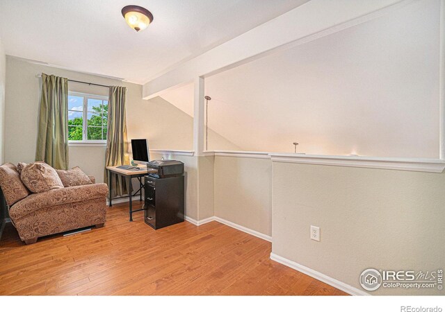 2502 Ballard Ln, Fort Collins, CO 80524 - home office with wood finished floors and baseboards