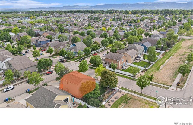 2502 Ballard Ln, Fort Collins, CO 80524 - aerial perspective of suburban area featuring a mountainous background