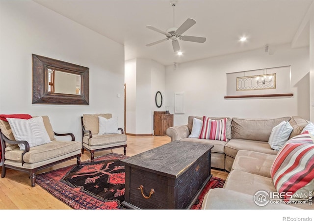4157 19th St, Boulder, CO 80304 - living room with wood finished floors, recessed lighting, ceiling fan, a chandelier, and baseboards