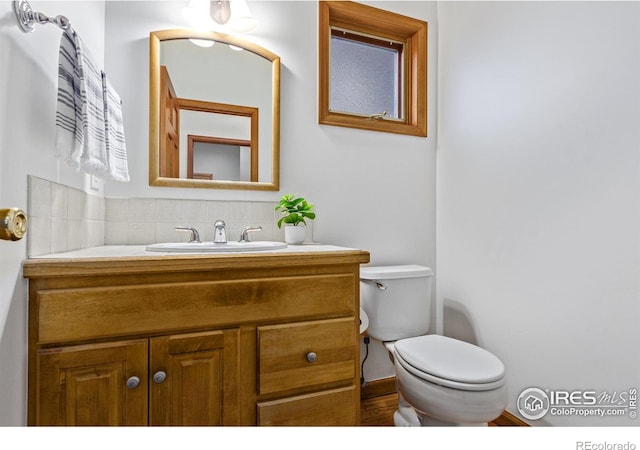 4157 19th St, Boulder, CO 80304 - half bath with toilet, vanity, and backsplash