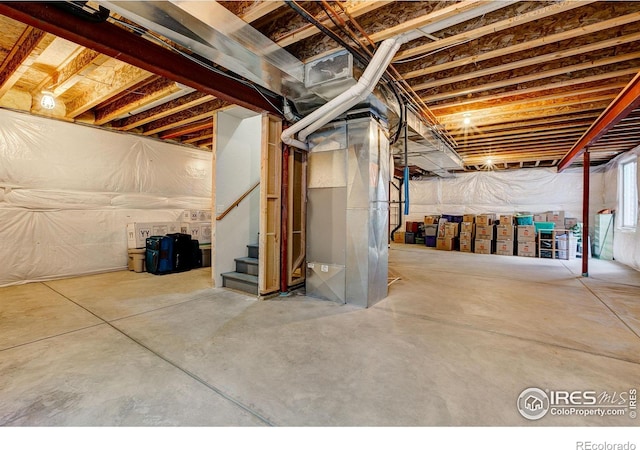 1414 Sheep Creek Ct, Fort Collins, CO 80526 - basement featuring stairway and heating unit