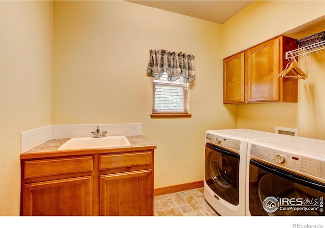 1414 Sheep Creek Ct, Fort Collins, CO 80526 - washroom with cabinet space, independent washer and dryer, and baseboards