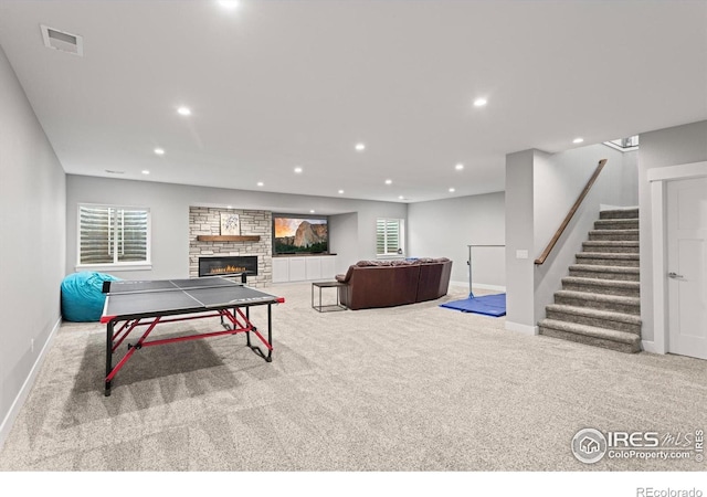5031 Prairie Lark Ln, Severance, CO 80615 - recreation room with carpet, recessed lighting, baseboards, and a fireplace
